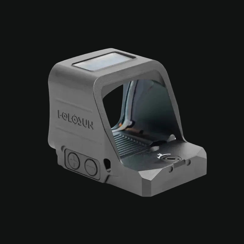 Red dot reflex sight with clear lens window and side control buttons, metal mount