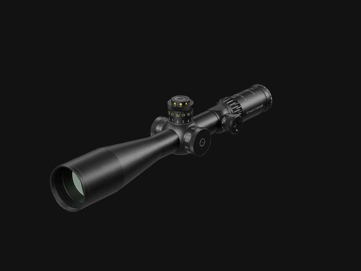Schmidt Bender riflescope angled view with long tube and side focus knobs