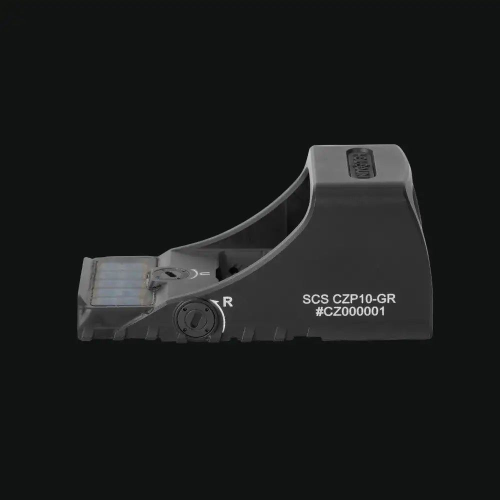 Compact reflex sight side view with solar panel and adjustment dial