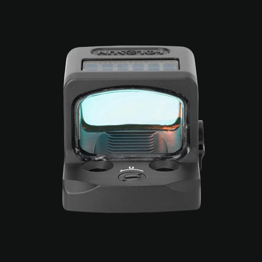 Enclosed solar reflex sight, front view of illuminated window and adjustment knobs, dark gray