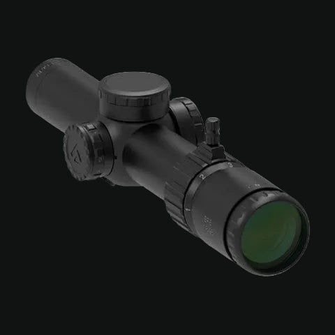 Angled LPVO riflescope with green-tinted objective lens and adjustment turrets