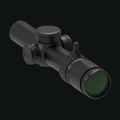 Angled LPVO riflescope with green-tinted objective lens and adjustment turrets