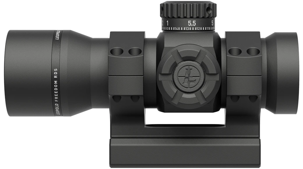 Black red dot scope front view showing emitter housing and top dial on mount