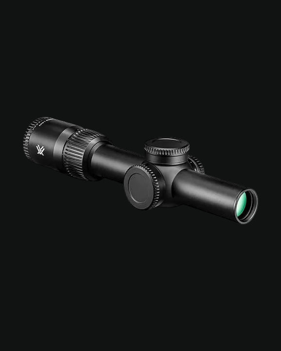 Black LPVO riflescope with side turret and green objective lens