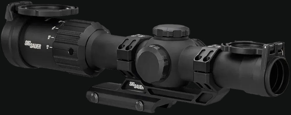 LPVO riflescope with objective lens, side control knob, and top mounting rail