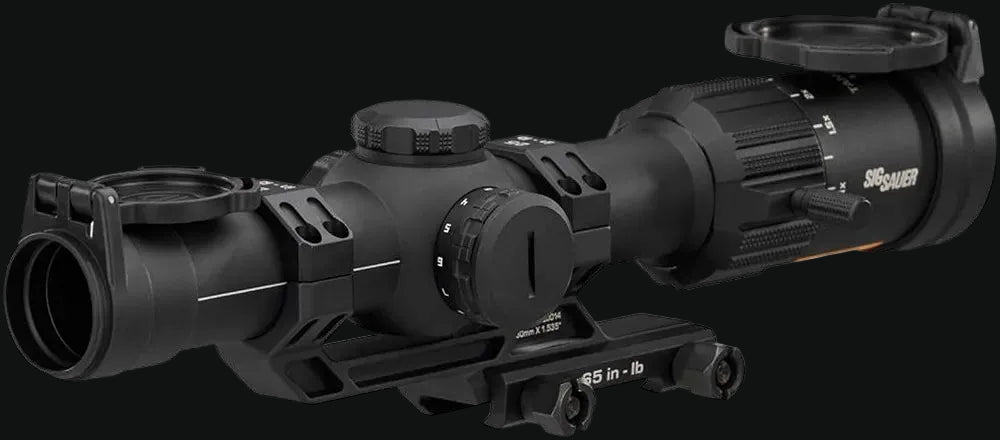LPVO riflescope with turret knob, mounting base, and large objective lens