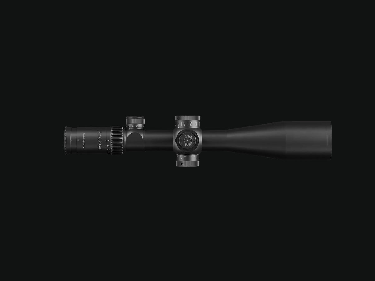 Schmidt Bender riflescope side profile with adjustment knobs and scope caps