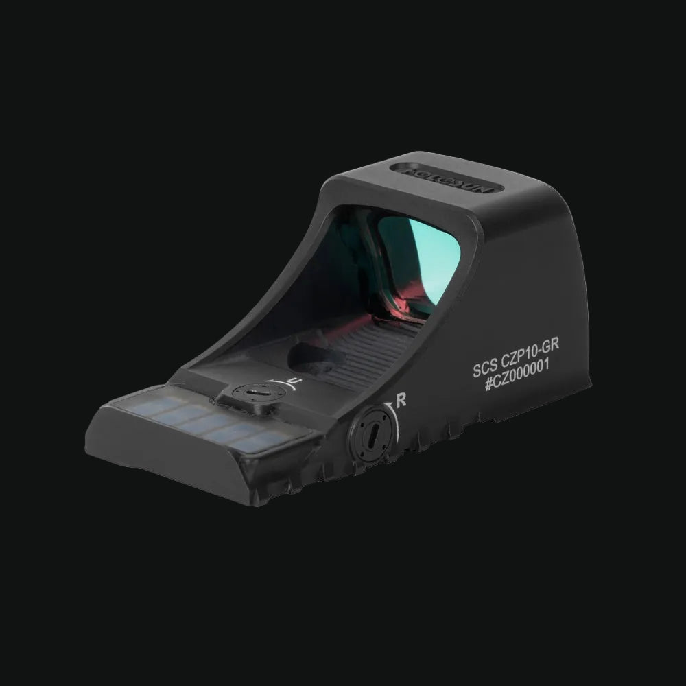 Compact reflex sight with circular dot reticle window and solar panel housing