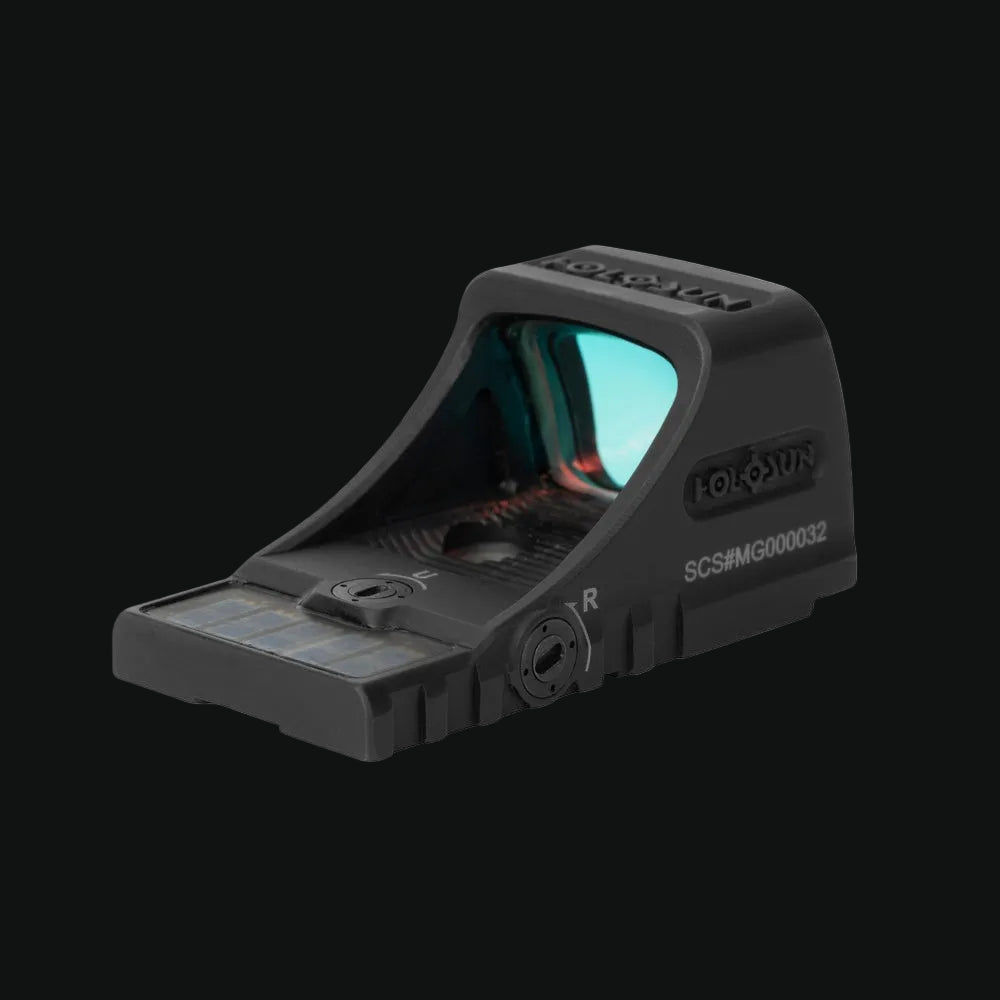 Black reflex sight with side mounting base, illuminated lens window, and control buttons