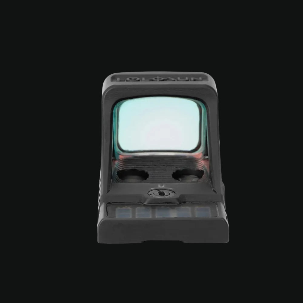 Compact black reflex sight with square lens window and front adjustment buttons