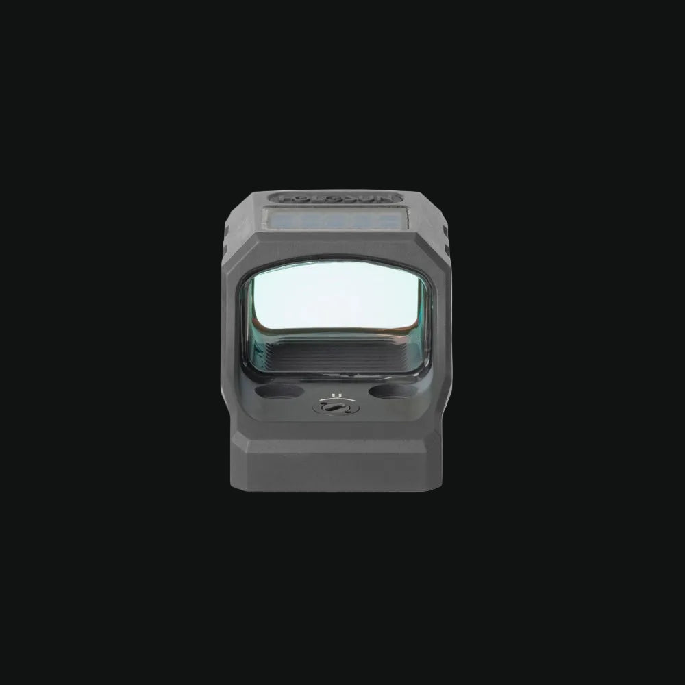 Gray pistol reflex sight front view with reticle window and protected glass