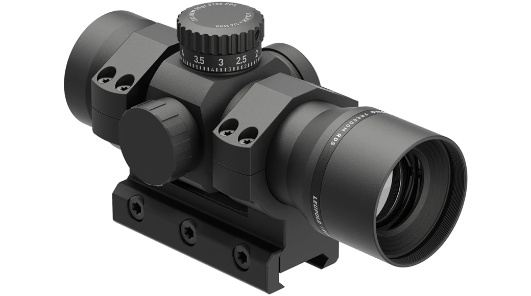 Black red dot scope on mount with objective lens and side elevation knobs