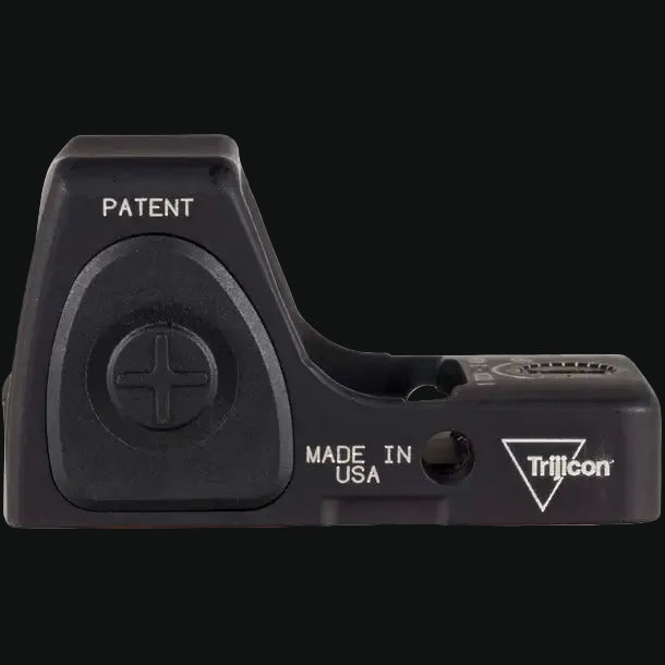 Black Trijicon red dot optic with PATENT and MADE IN USA text.