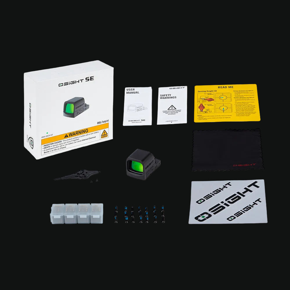 Enclosed green dot sight kit with RMSc housing, manuals, and mounting accessories